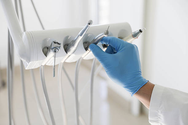 Professional Tooth Extraction technician working in Ore City, TX